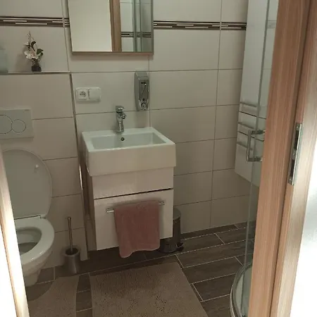 Familly Apartmens Quarto em Acomodações Particulares *